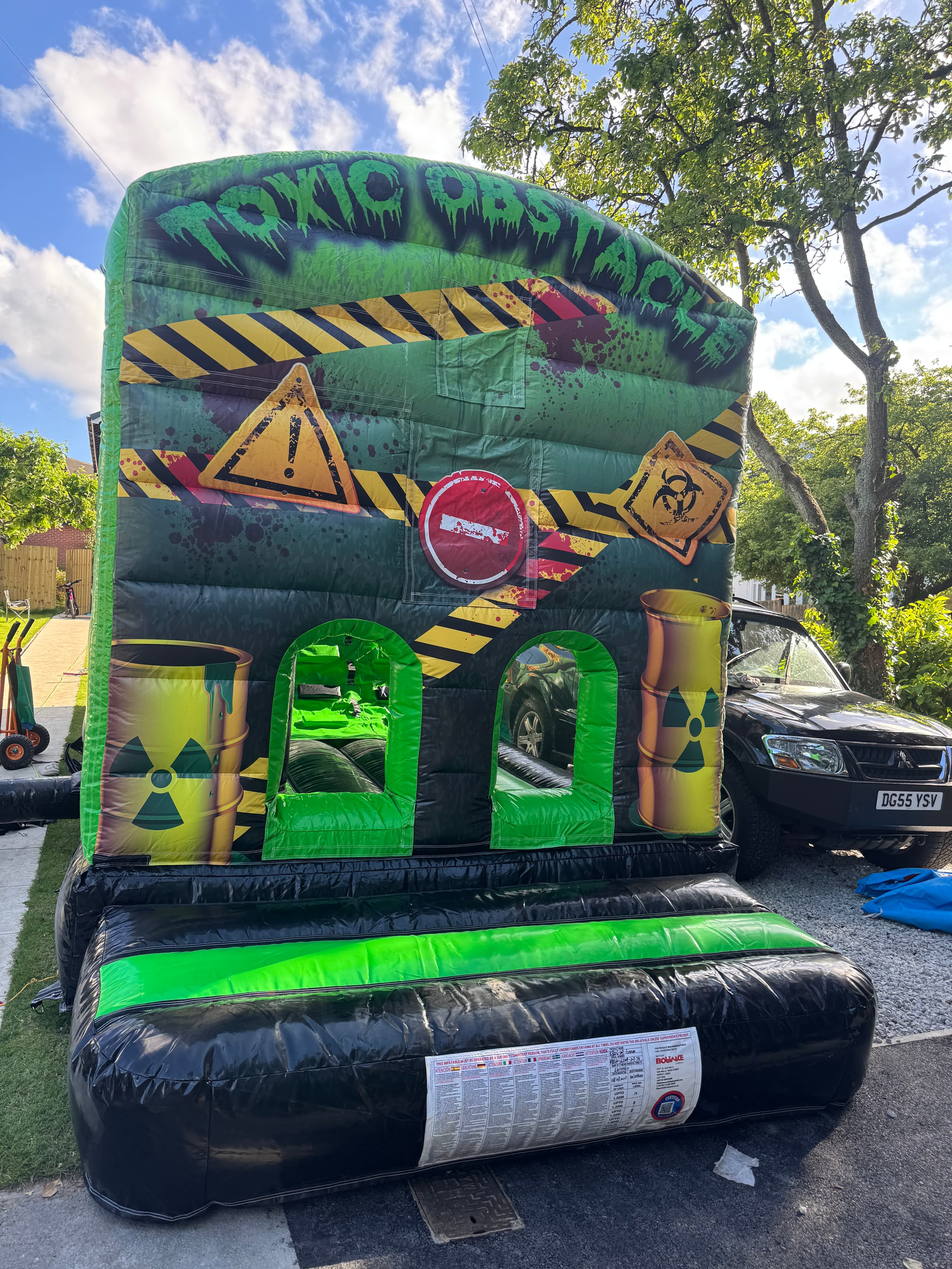 Toxic waste disco fun run bouncy castle for hire in Leeds