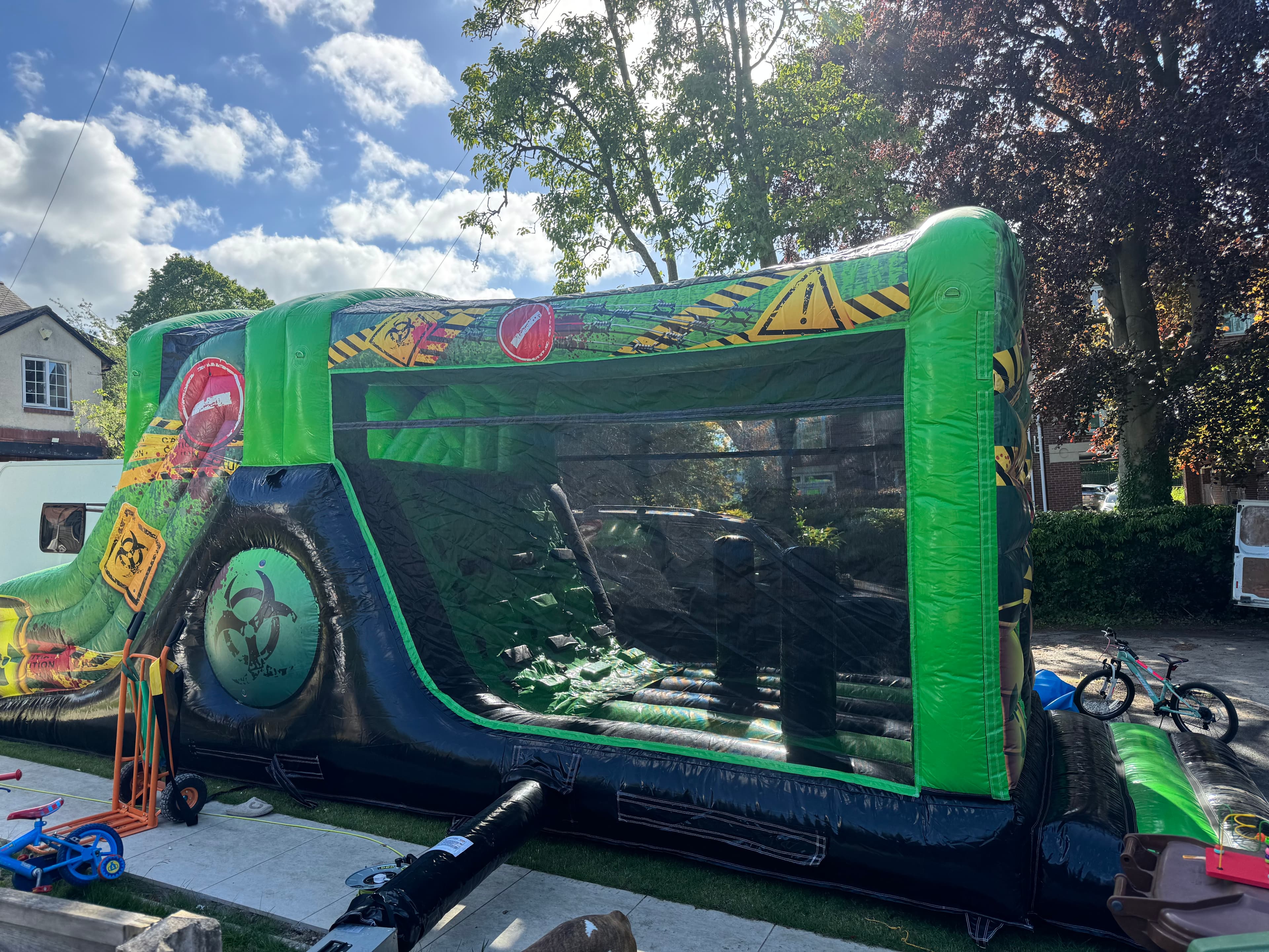 Toxic waste disco fun run bouncy castle for hire in Leeds