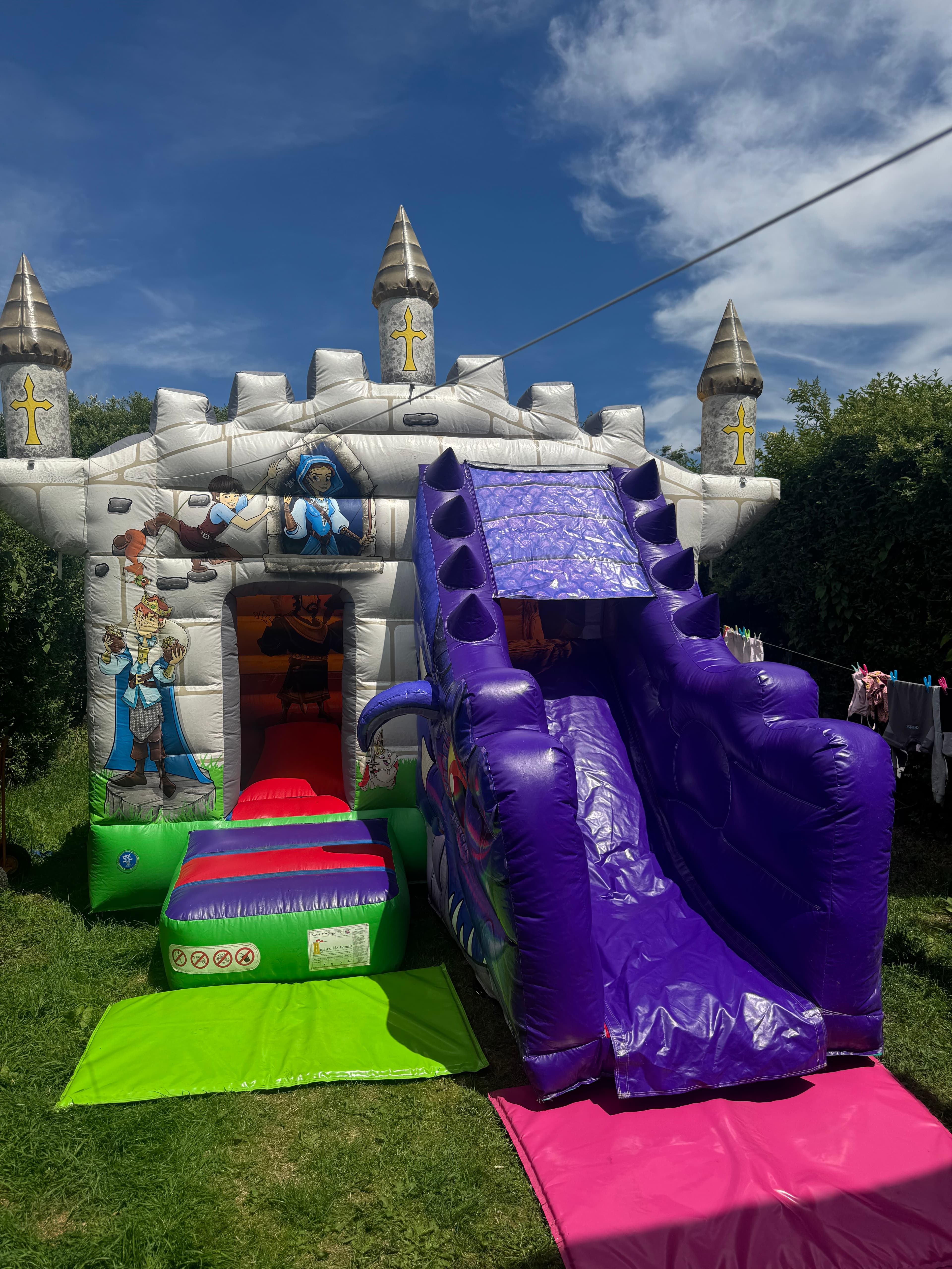 Dragon Castle with Slide bouncy castle for hire in Leeds