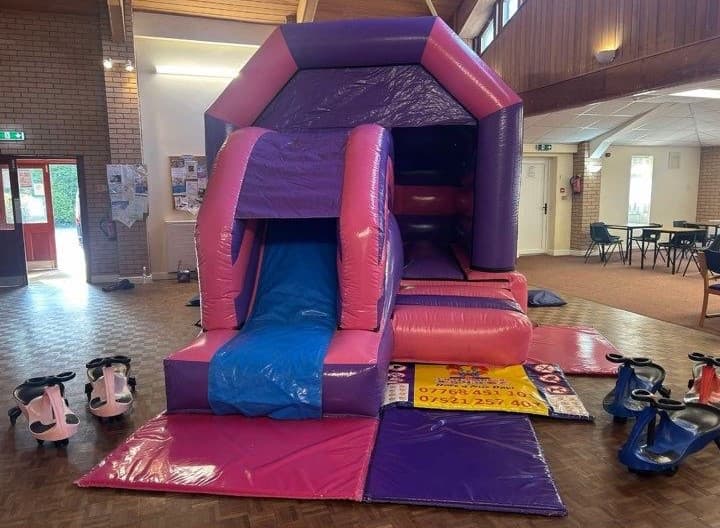 Pink / Purple Castle only castle no bikes bouncy castle for hire in Leeds